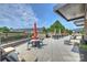 Relaxing community patio with seating, fire pit, and grills at 3630 N Davidson St # 4413, Charlotte, NC 28205