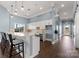 Well-equipped community kitchen with bar seating and modern appliances at 4018 Grace Pointe Dr, Indian Trail, NC 28079