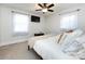 This bedroom has neutral walls and carpet, ceiling fan, and a mounted TV at 4837 Holbrook Dr, Charlotte, NC 28212