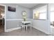 Bright dining area with view into kitchen, featuring dining table and chair set at 4837 Holbrook Dr, Charlotte, NC 28212
