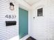 Welcoming front entrance with stylish door, modern hardware, and exterior lighting at 4837 Holbrook Dr, Charlotte, NC 28212