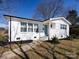 Charming brick home featuring a well-manicured lawn and inviting front entrance at 4837 Holbrook Dr, Charlotte, NC 28212