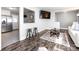 Modern living area with bar seating offering a convenient pass through to the kitchen at 4837 Holbrook Dr, Charlotte, NC 28212