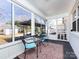 Spacious sunroom with plenty of natural light and outdoor views, ideal for entertaining at 4837 Holbrook Dr, Charlotte, NC 28212