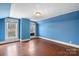 Spacious bedroom with blue walls and wood floors at 608 6Th Sw St, Conover, NC 28613