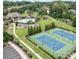 Aerial view of community amenities including a pool, tennis courts and clubhouse at 6124 Music Arbor Ln, Huntersville, NC 28078