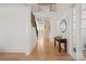 Bright foyer showcasing hardwood floors, staircase and elegant interior design at 6124 Music Arbor Ln, Huntersville, NC 28078