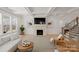 Inviting living room with a modern fireplace and stylish decor at 6124 Music Arbor Ln, Huntersville, NC 28078