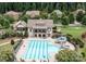 Resort-style pool with slide and plenty of seating for hot summer days at 6124 Music Arbor Ln, Huntersville, NC 28078