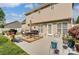 Private backyard with patio furniture and plenty of space for entertaining at 8244 Fox Swamp Rd, Charlotte, NC 28215