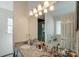 Double vanity bathroom with granite countertop and large mirror at 8244 Fox Swamp Rd, Charlotte, NC 28215