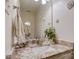 Bathroom with granite vanity, single sink, and decorative wall accents at 8244 Fox Swamp Rd, Charlotte, NC 28215