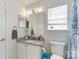 Bathroom with granite countertop, updated vanity, and shower/tub combo at 8244 Fox Swamp Rd, Charlotte, NC 28215