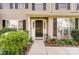 Inviting front entrance with landscaping and a walkway at 8244 Fox Swamp Rd, Charlotte, NC 28215