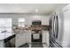 Modern kitchen with stainless steel appliances and granite countertops at 8244 Fox Swamp Rd, Charlotte, NC 28215