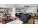 Open living space with kitchen, seating and a work area at 8244 Fox Swamp Rd, Charlotte, NC 28215