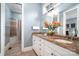 Bathroom with double vanity, granite countertop, and a shower/tub combo at 104 Cramer Mountain Woods None, Cramerton, NC 28032