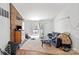 Cozy living room featuring a brick fireplace and sliding glass doors leading to the backyard at 1043 Pineborough Rd, Charlotte, NC 28212