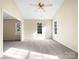 Bright bedroom with vaulted ceiling, carpet and multiple windows at 11006 Renoir Ct, Charlotte, NC 28215