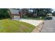 Two-story house with a large driveway at 11531 Willows Wisp Dr, Charlotte, NC 28277