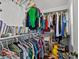 Large bedroom closet with ample hanging and shelf space at 11700 Parks Farm Ln, Charlotte, NC 28277