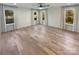 Bright bedroom with hardwood floors and large windows offering natural light at 1201 Pierson Dr, Charlotte, NC 28205