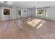 Spacious living area featuring hardwood floors and abundant natural light at 1201 Pierson Dr, Charlotte, NC 28205