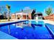 Inviting in-ground pool with brick home and pergola in background at 1250 Wendover Ave, Albemarle, NC 28001