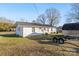 Home's exterior and backyard with a boat trailer at 1317 Nicholson Ave, Rock Hill, SC 29732