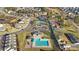 Aerial view of community amenities including pool, tennis courts, and clubhouse at 136 Margo Ln, Statesville, NC 28677