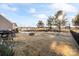 Large backyard with firepit and patio area at 136 Margo Ln, Statesville, NC 28677