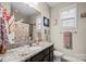 Clean bathroom with granite vanity and updated fixtures at 136 Margo Ln, Statesville, NC 28677