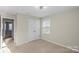 Bedroom with double doors and carpet flooring at 136 Margo Ln, Statesville, NC 28677