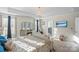 Spacious primary bedroom with ensuite bathroom and large windows at 136 Margo Ln, Statesville, NC 28677