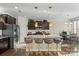 Modern kitchen with granite counters, stainless steel appliances, and an island at 136 Margo Ln, Statesville, NC 28677
