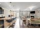 Open-concept kitchen and Gathering room with granite island and fireplace at 136 Margo Ln, Statesville, NC 28677