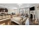 Spacious living room featuring a fireplace and large windows at 136 Margo Ln, Statesville, NC 28677