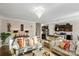 Open living room with two sofas and view into the kitchen at 136 Margo Ln, Statesville, NC 28677