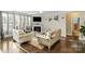 Comfortable living room with hardwood floors, fireplace, and lots of natural light at 136 Margo Ln, Statesville, NC 28677
