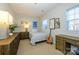 Cozy bedroom with a comfortable bed and built-in desk at 14021 Labeau Ave, Charlotte, NC 28277