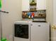 Convenient laundry room with washer, dryer, and extra storage at 14021 Labeau Ave, Charlotte, NC 28277