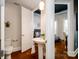 Simple bathroom with pedestal sink, toilet, and bedroom view at 2338 Yadkin Ave # 203, Charlotte, NC 28205