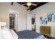 Comfortable bedroom with a queen bed and views of the kitchen and bathroom at 2338 Yadkin Ave # 203, Charlotte, NC 28205