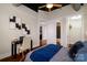 Elegant bedroom with a queen-size bed and home office space at 2338 Yadkin Ave # 203, Charlotte, NC 28205