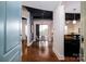 Open concept entryway with dining area and dark stained concrete floors at 2338 Yadkin Ave # 203, Charlotte, NC 28205