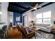 Open-concept living space with a stylish sofa, chairs, and a view into the dining and kitchen at 2338 Yadkin Ave # 203, Charlotte, NC 28205
