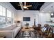 Spacious living room with light-colored sofa and armchairs, a coffee table, and a TV at 2338 Yadkin Ave # 203, Charlotte, NC 28205