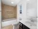 Bright bathroom featuring tile surround, tub and window for natural light at 24078 Sailfish Dr # 1152, Lancaster, SC 29720