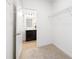 Walk-in closet with shelves offering ample storage, and a view into an attached, well-lit bathroom at 24078 Sailfish Dr # 1152, Lancaster, SC 29720