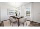 Bright dining area with modern chairs and a statement chandelier at 24078 Sailfish Dr # 1152, Lancaster, SC 29720